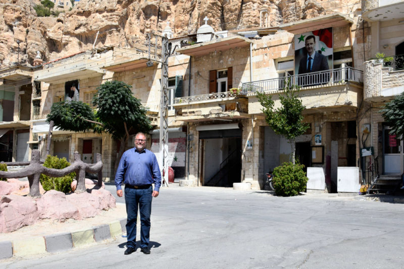 Mikael Jansson standing in the Central Square of Maaloula. Photo: FWM